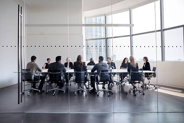 colleagues at business meeting in conference room colleagues at business meeting in conference room